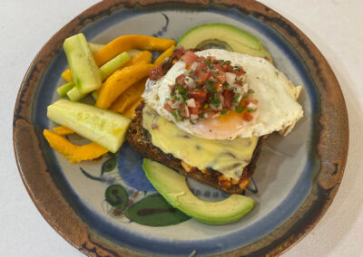 Seed bread mollete with a fried egg at zandoyo bed & breakfast